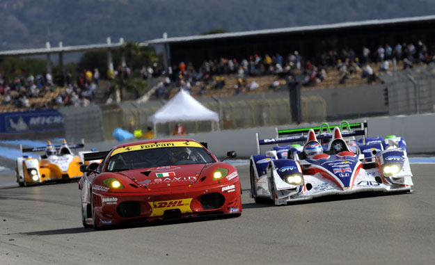 Mike Newton struggles to pass a GT car. On the grid. Photo: Peter May, Dailysportscar